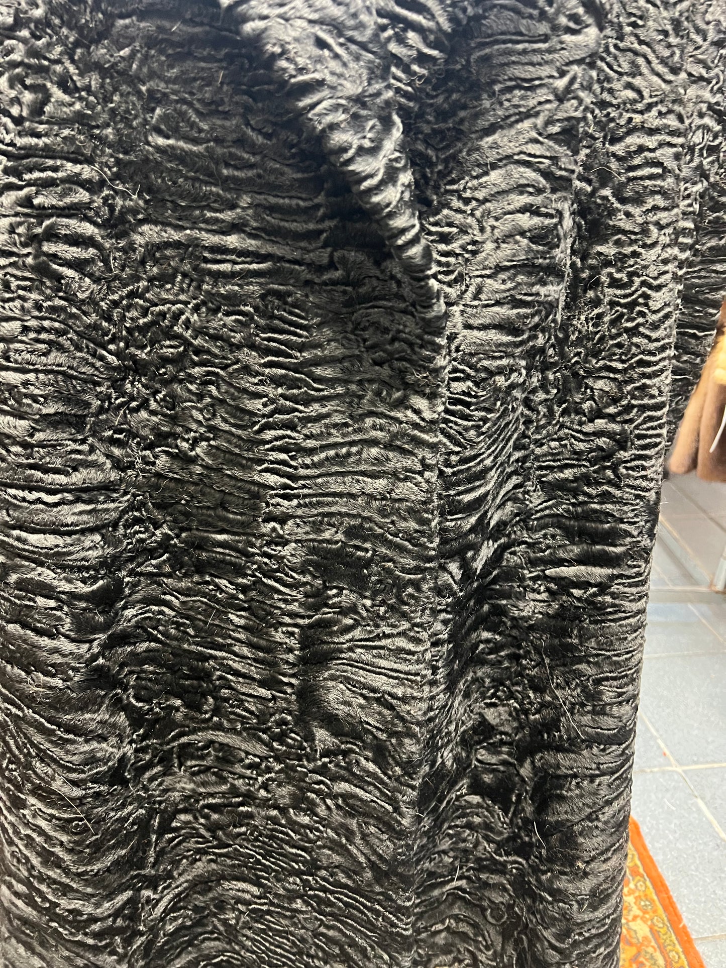 Manteau en fourrure astrakan