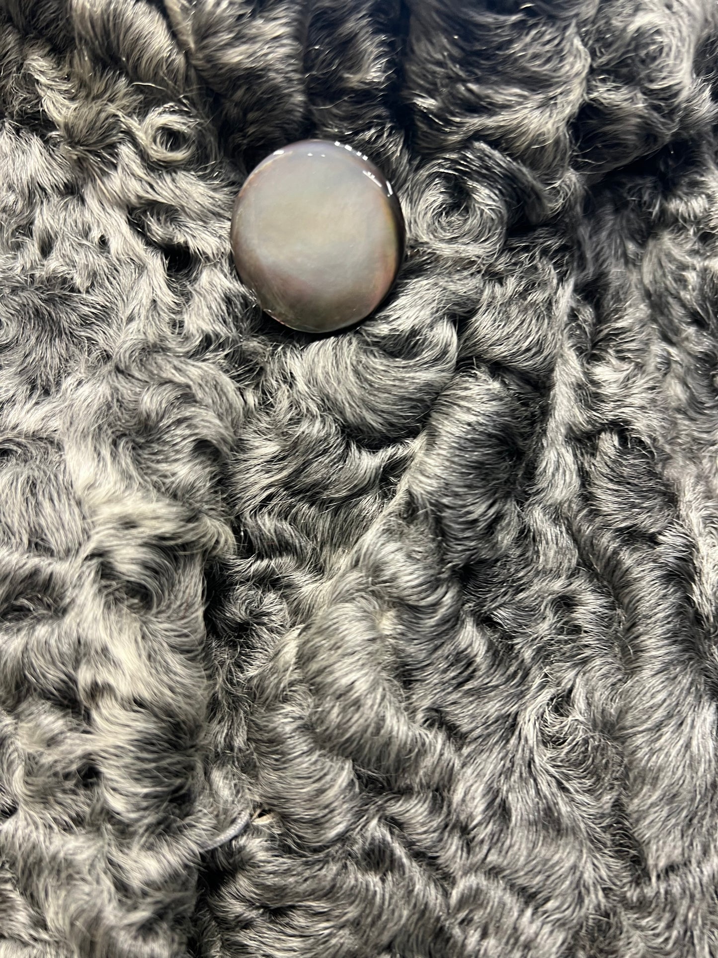 Manteau astrakan avec capuche